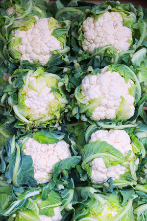 cauliflower on counter  at  marketの写真素材