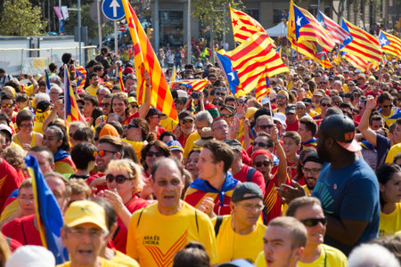 BARCELONA, SPAIN - SEPTEMBER 11, 2014: People at  rally to mark the 300th anniversary of the loss of independence of Cataloniaのeditorial素材