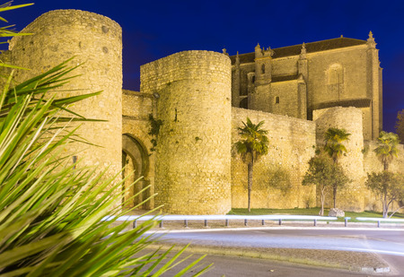 Night view of  gates   walls and Church of the Holy Spirit. Ronda, Spainのeditorial素材