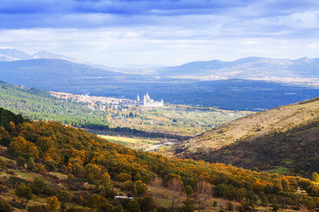 Autumn landscape with  El Escorial - is historical residence of the King of Spain