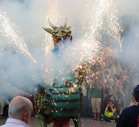 BADALONA, SPAIN - MAY 10, 2014: Night of Saint Anastasi. Show with different fireworks on  town squareのeditorial素材