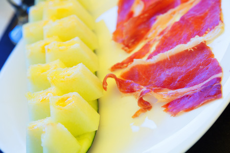 melon and ham - spanish traditional snack on plateの写真素材