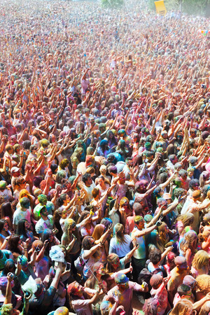 BARCELONA, SPAIN - APRIL 12, 2015: Many happy dirty people at Festival de los colores Holy at Barcelona. It is traditional holiday  of Indian cultureのeditorial素材