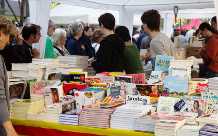 BARCELONA, SPAIN - APRIL 23, 2015: Books on stalls in Saint George day. in April 23, 2013 in Barcelona, Spain.Saint George is the patron saint of city. Focus on booksのeditorial素材