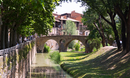 VIC, SPAIN - JUNE 9, 2015: Ancient stone bridge over  river  in Vicのeditorial素材