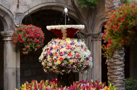 Feast of Corpus Christi. Egg n jet of water in the fountains decorated with flowersの写真素材