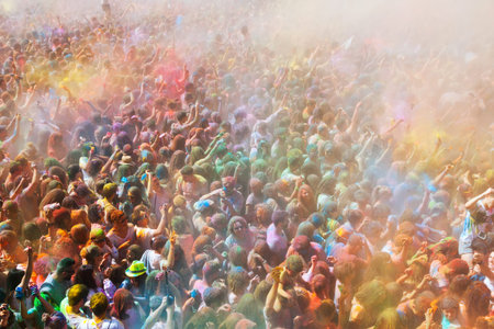 BARCELONA, SPAIN - APRIL 12, 2015: Many happy people during   Festival de los colores Holi at...