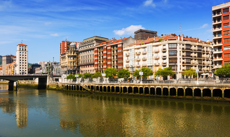 Embankment of  Ibaizabal river with Railway station. Bilbao, Spainの写真素材