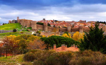 Avila with  town walls in autumn. Spain