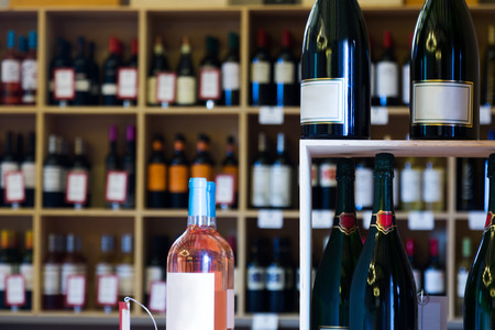 Display with wide assortment of European wine in bottlesの写真素材