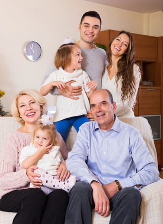 smiling family with grand childrenの写真素材