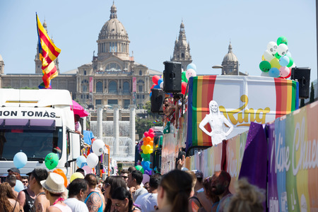 BARCELONA, SPAIN â JULY 9, 2016: happy festive people and decorated trucks on Pride parade in Barcelona, Spainのeditorial素材