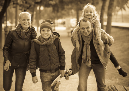 outdoor portrait of american family with son and daughterの写真素材