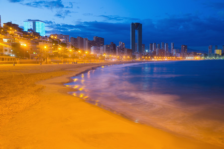 night panoramic view on lights of Benidorm city with seafront and modern skyscrapersの写真素材