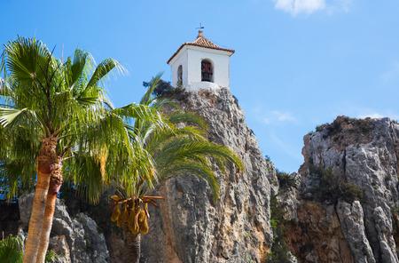 Old building of Guadalest castle surrounded by forest and mountainsのeditorial素材