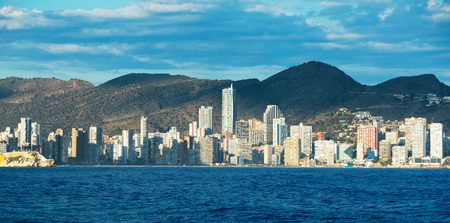 Daytime Benidorm cityscape with sandy beaches and modern high housingの写真素材