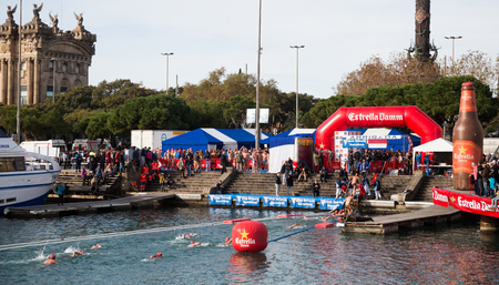 BARCELONA, SPAIN â DECEMBER 25, 2016:  Copa de Nadal de NataciÃ³ traditional open water swim at Christmas day. Barcelona, Spainのeditorial素材