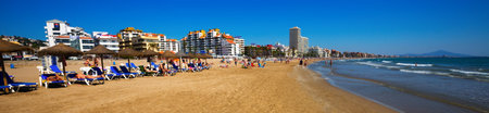 PENISCOLA, SPAIN - MAY 16, 2016: Modern buildings, hotels and sand beach at sea side in Catalonian town, Valencia, Spainのeditorial素材
