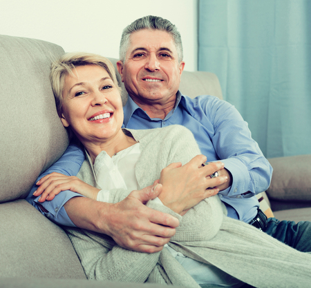 Mature russian married couple understand and love each other and are happy in houseの写真素材