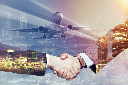 Beneficial agreement made in business trip in city by partnersの写真素材