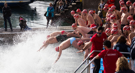 BARCELONA, SPAIN  DECEMBER 25, 2016:  Copa de Nadal de Natació traditional open water swim at Christmas day. Barcelona, Spainのeditorial素材