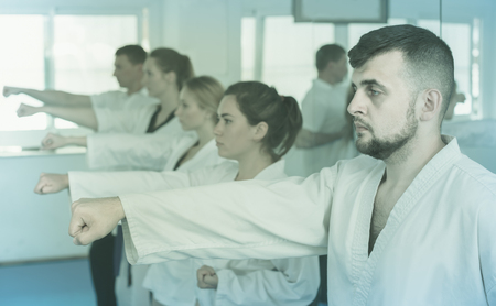 Young european  trainees expressing interest in attending karate classの写真素材