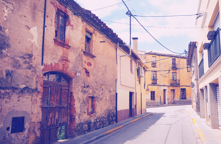 Old street in Catalan town. Breda, Spainのeditorial素材