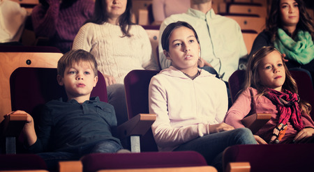 Portrait of number of people enjoying film screening in cinemaの写真素材