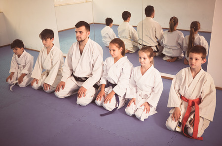 Young children expressing interest in attending karate classの写真素材