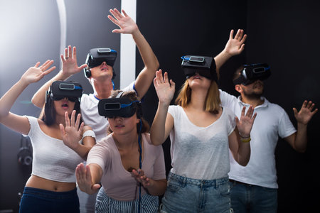 portrait of people immersed in virtual reality with the help of 3d glasses