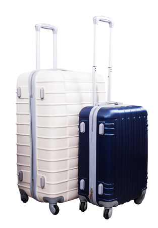 Two suitcases of different size with wheels standing uprightの写真素材