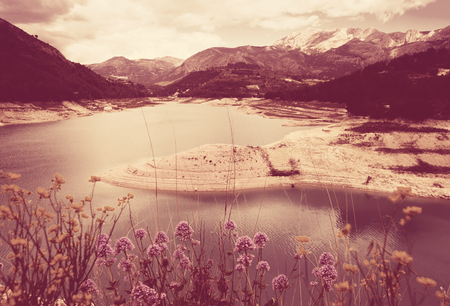 scenic landmark with Guadalest water storage with turquoise water located in valley の写真素材