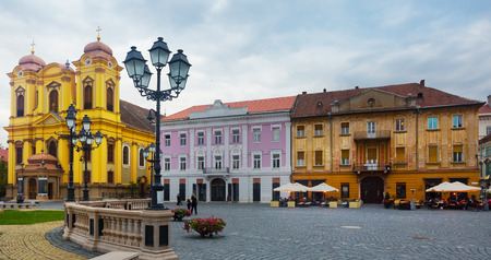 Picturesque colored architecture of Unirii Square in romanian town Timisoaraのeditorial素材