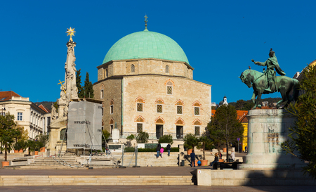 PECS, HUNGARY - NOVEMBER 01, 2017: View of main square Szechenyi ter on background with mosque of Pasha Qasim Victoriousのeditorial素材