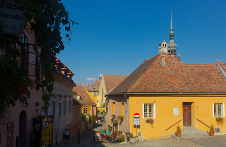 SIGHISOARA, ROMANIA - SEPTEMBER 16, 2017: View of Sighisoara narrow streets in sunny autumn day, Romaniaのeditorial素材