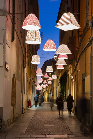 View on lanes with Christmas illumination in night Parma of Italy outdoors.の写真素材