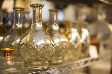 Image of glass carafe in the shop with goods for decoration の写真素材
