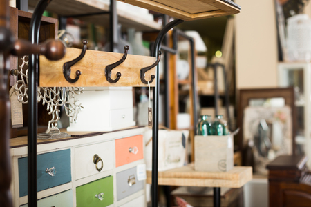 Old furniture offered for sale in secondhand shopの写真素材