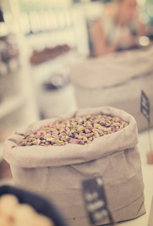 Photo of mix pistachios in the food store.の写真素材