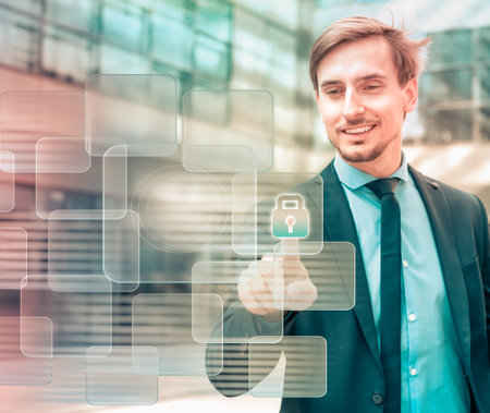 Businessman touching digital interface with finger on industrial business background