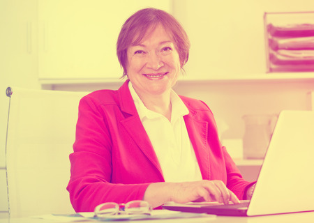 Female employee having a productive day at work in officeの写真素材