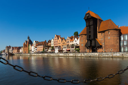 Embankment of Motlawa river in Gdansk in sunny spring day, Poland