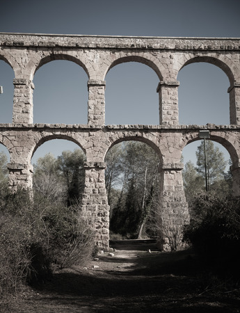 View of Pont del Diable with two levels of arches, antique Roman aqueduct near Spanish town of Tarragonaの写真素材