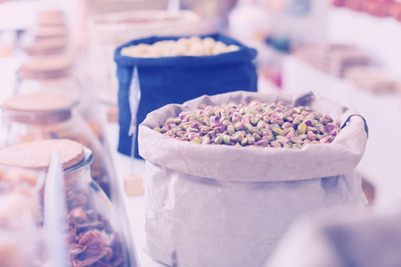 Illustration of bag with pistachios in the shop.の写真素材