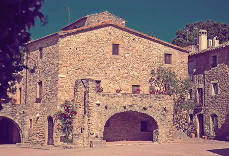 Edifices on main square in the Catalan village of Monells, Spain