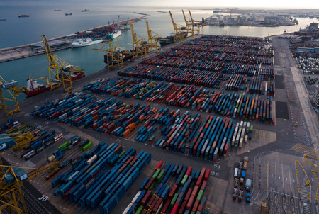 BARCELONA, SPAIN - DECEMBER 25, 2017:  Shipping containers at Industrial port of Barcelona in daytime. 
One of the largest port in Mediterranean, has more than 3,000 metres of berthing lineのeditorial素材