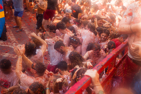 BUNOL, SPAIN - AUGUST 30, 2018: People during La Tomatina festival.
La Tomatina festival where people are fighting with tomatoes at streetのeditorial素材