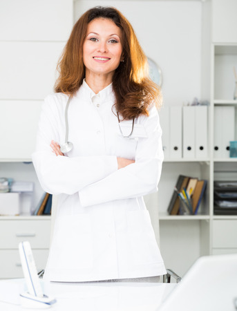 Portrait of woman in uniform who is working in the clinic.の写真素材