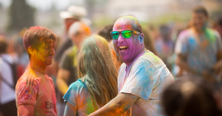 SANTA COLOMA DE GRAMENET, SPAIN - MAY 28, 2017: People celebrating coming of spring at Holi Festival...