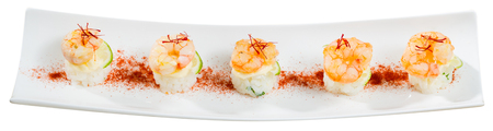 Grilled shrimps on rice balls with lime and saffron. Isolated over white backgroundの写真素材
